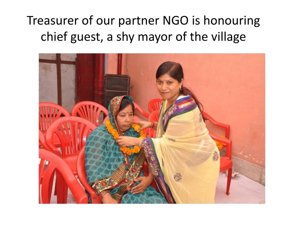 Honoring Mayor - Treasurer of partner NGO honoring the mayor